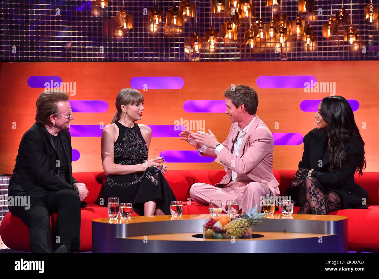 EDITORIAL USE ONLY (left-right) Bono, Taylor Swift, Eddie Redmayne and Alex Scott during filming for the Graham Norton Show at BBC Studioworks 6 Television Centre, Wood Lane, London, to be aired on BBC One on Friday evening. Stock Photo