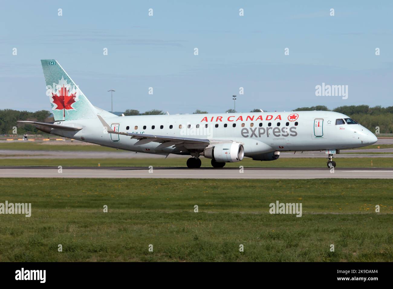 An Air Canada Express (Jazz Aviation) Embraer 170 on the runway of