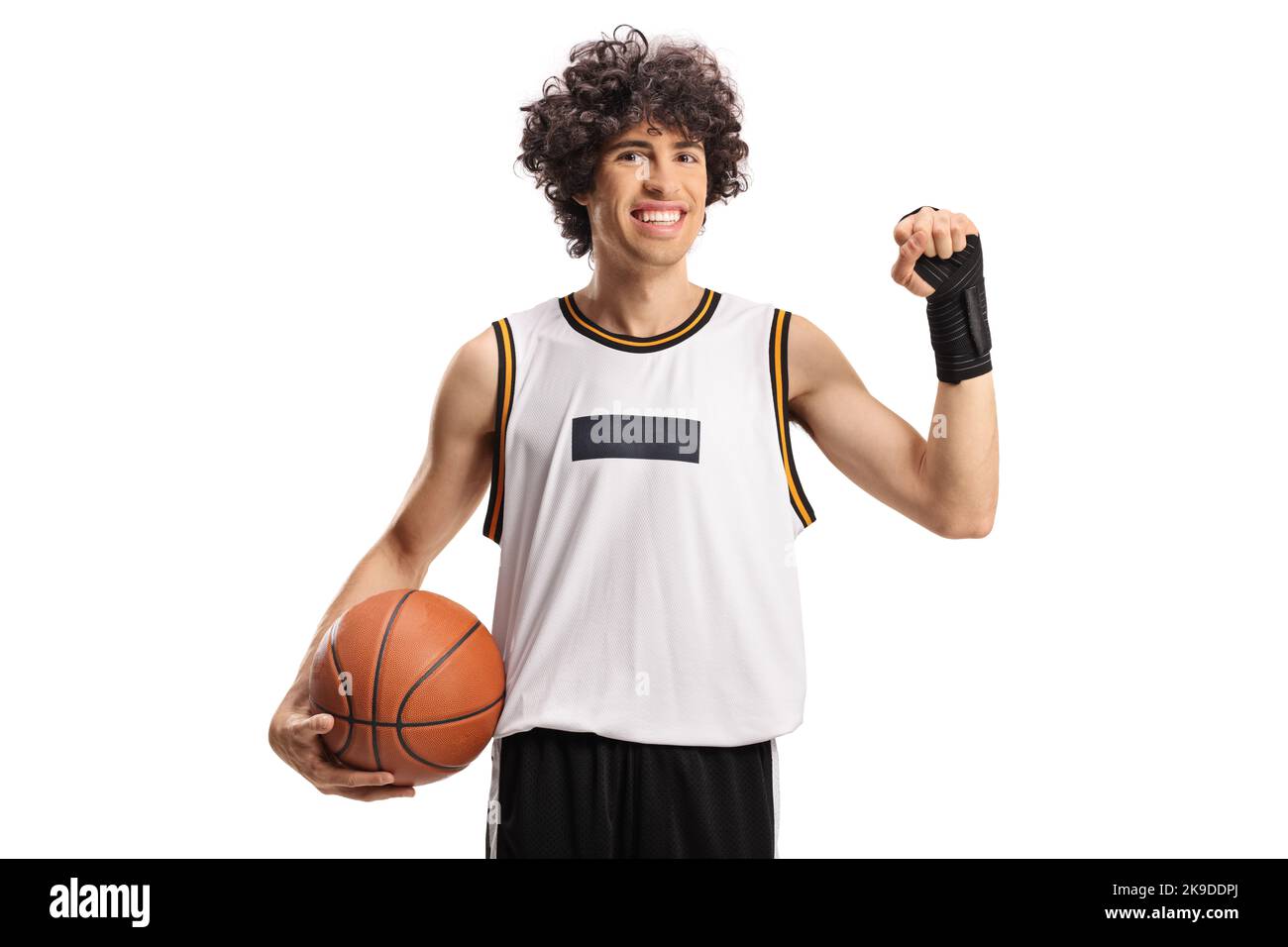 Basketball player wearing a wrist splint brace and smiling isolated on white background Stock