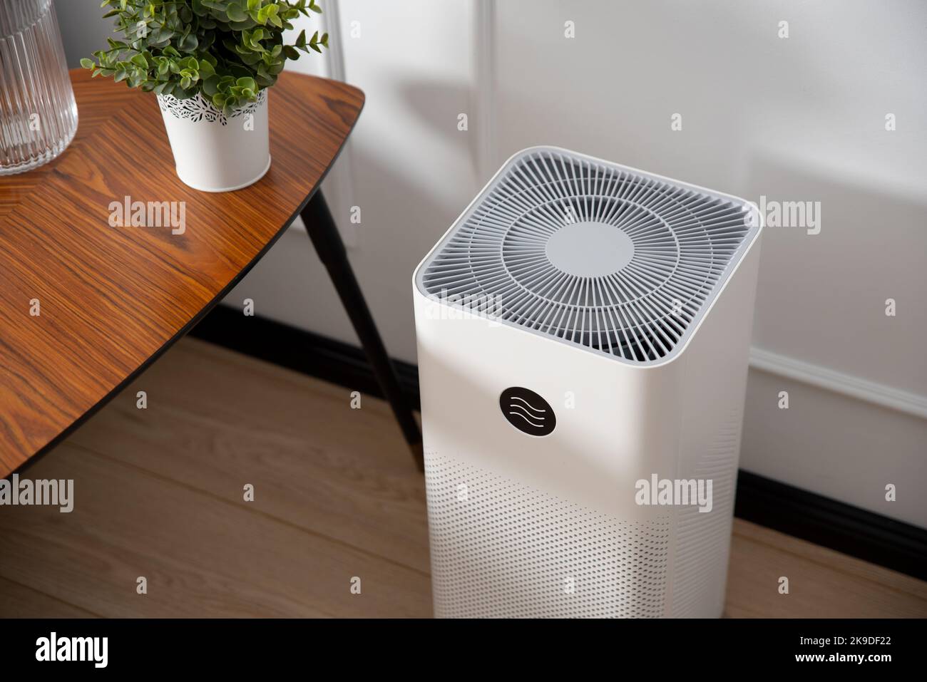 Air purifier, cleaner in living room, PM 2.5 dust protection Stock Photo