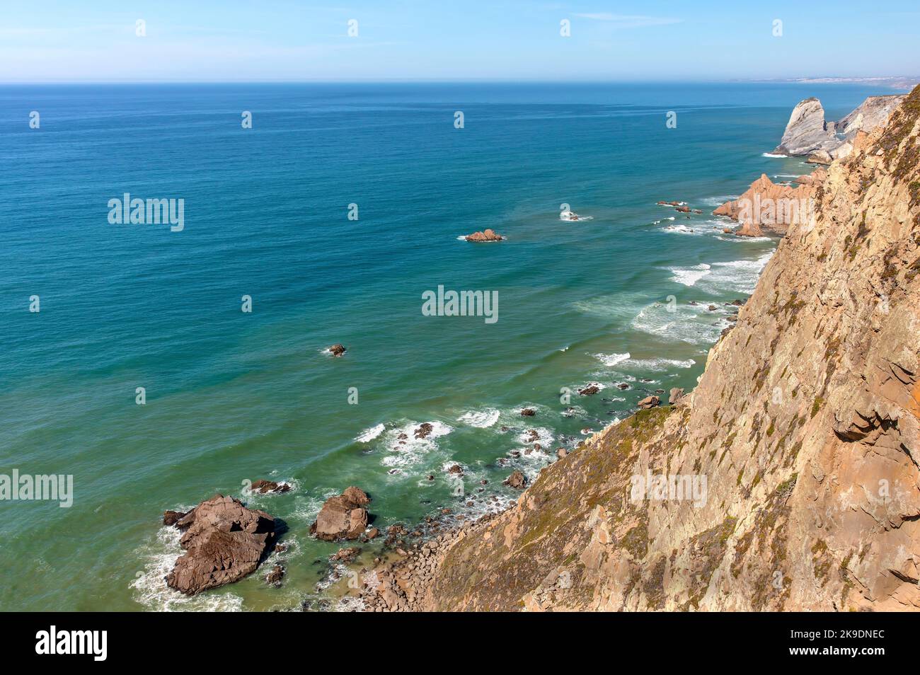 Waves and rocks in sea off coast in the Sintra-Cascais Natural Park, the most westerly point in continental Portugal Stock Photo