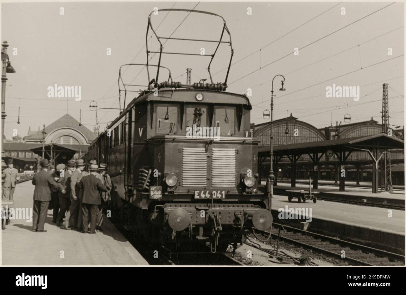 Passenger trains driven by electric at station. The