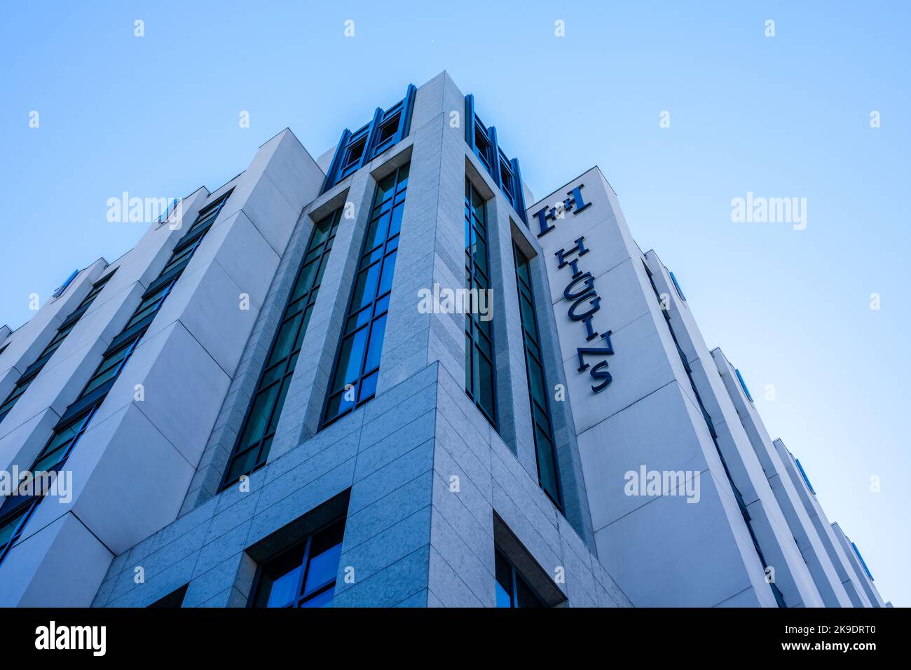 NEW ORLEANS, LA, USA - OCTOBER  26, 2022: Looking up at the corner of the Higgins Hotel building in the Warehouse District Stock Photo