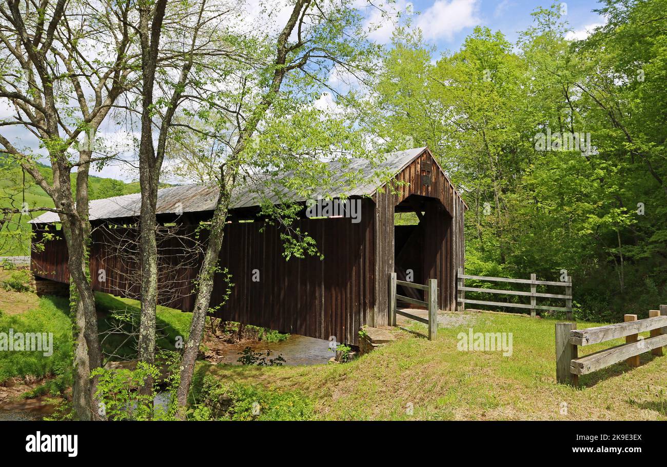 Three trees and Locust Creek covered bridge West Virginia Stock Photo
