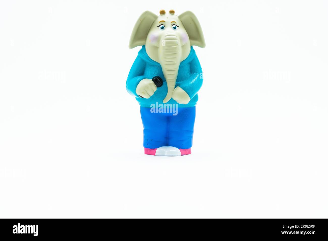 Funny toy elephant figurine with a microphone Stock Photo Alamy