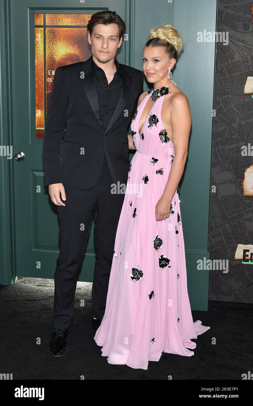 Jake Bongiovi and Millie Bobby Brown wearing dress by Louis