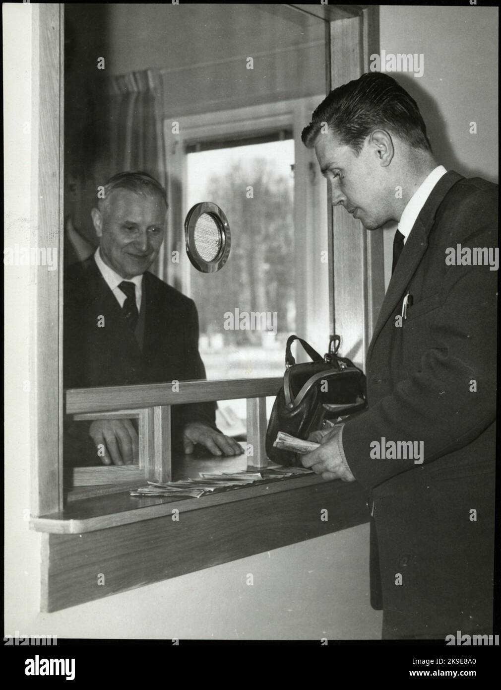 Car foreman Karl Fredriksson, on the left, and bus driver Lars Gustavsson in Nyköping's expedition room. Stock Photo