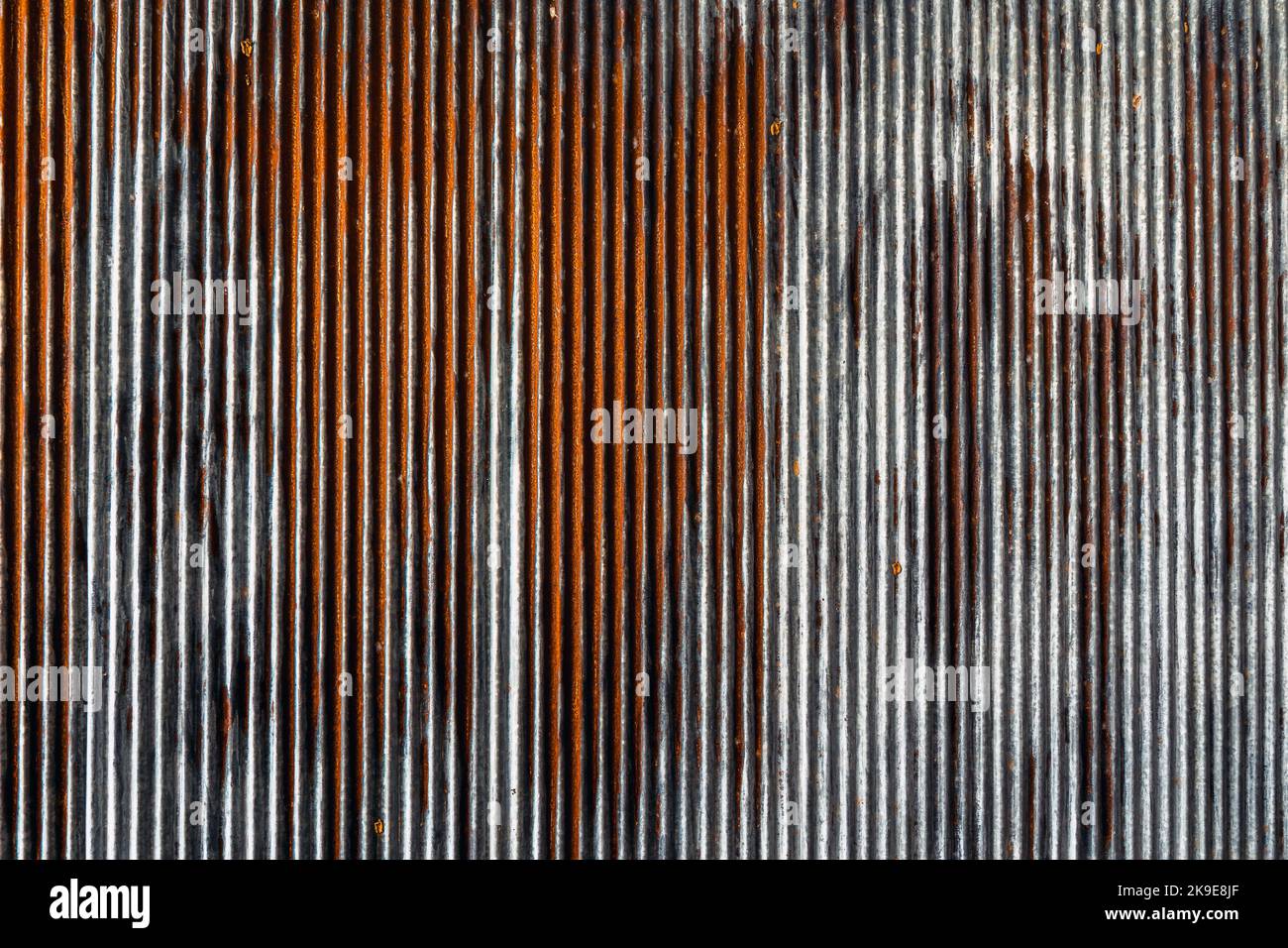 Artistic of old and rusty zinc sheet wall. Vintage style metal sheet