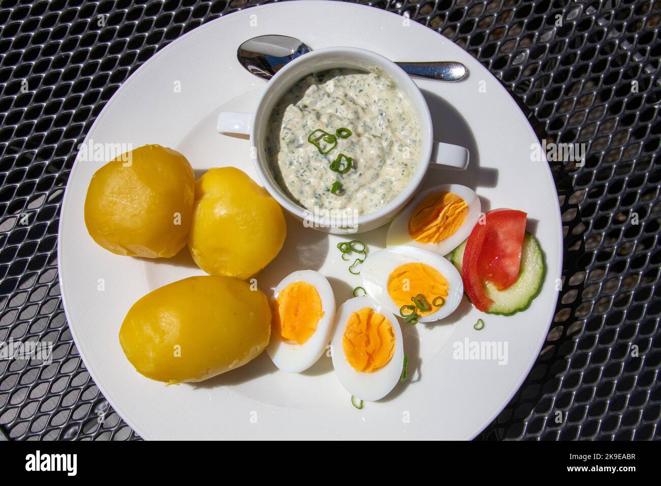 Pellkartoffeln und gruner, boiled potatoes with eggs and frankfurter green sauce at Zum Grunen Baum Restaurant, Bacharach, Germany Stock Photo