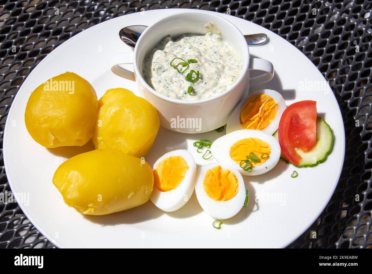 Pellkartoffeln und gruner, boiled potatoes with eggs and frankfurter green sauce at Zum Grunen Baum Restaurant, Bacharach, Germany Stock Photo