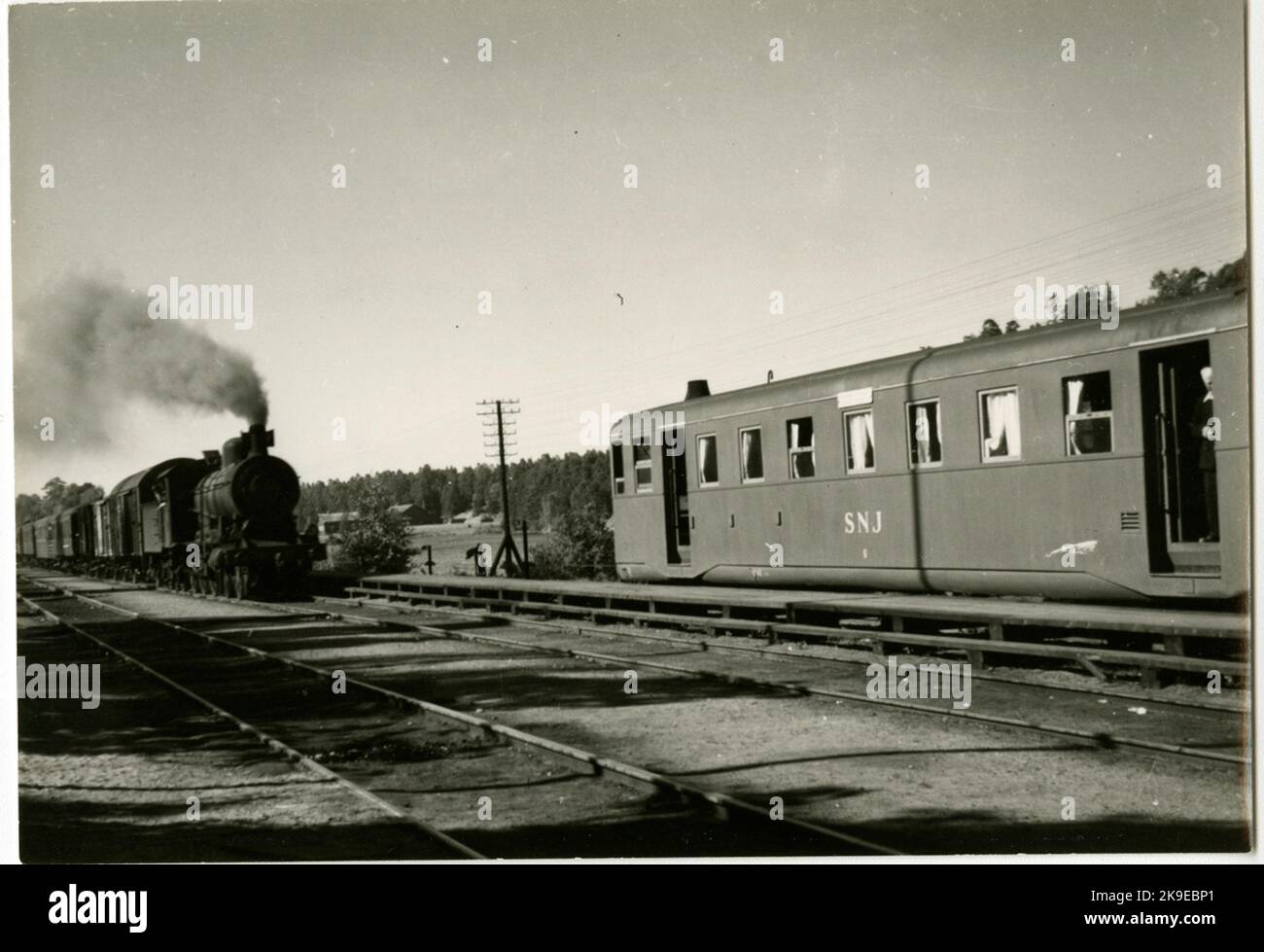 SNJ 5, and SNJ 11TEXT on the back of the photo 'Handens station Snj´Gotlandsxpressen 'with Lok no11Snj 5Snj 11foto 1.8.1948 Stock Photo