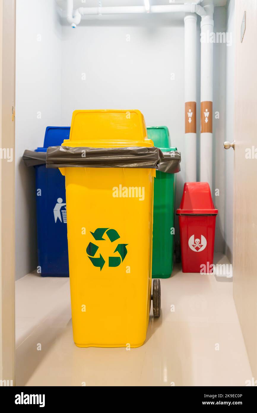 Yellow trash dustbin for Recyclable waste and Red, green and blue for