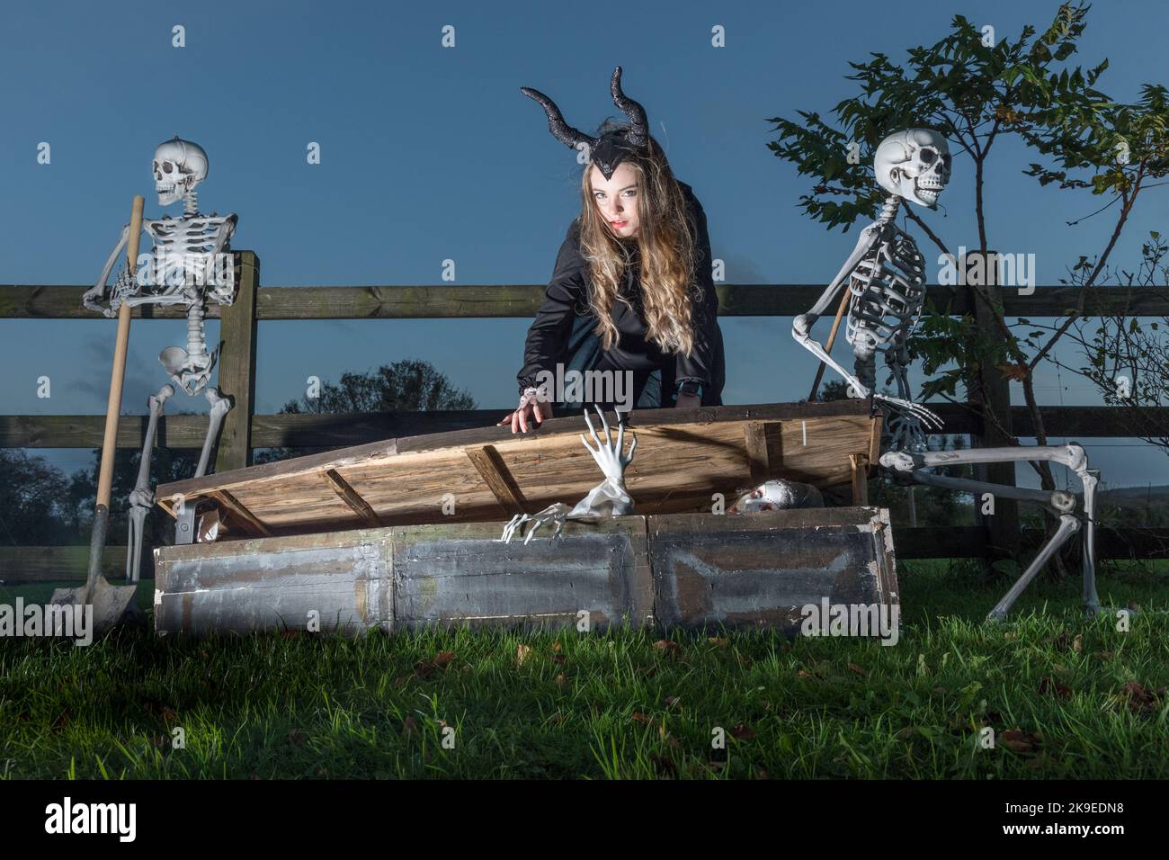 Bartlemy, Cork, Ireland. 27th October, 2022. Katie Barry dressed as Maleficent checks out a coffin as she prepares for the halloween weekend in Bartlemy, Co. Cork, Ireland. - Credit; David Creedon / Alamy Live News Stock Photo