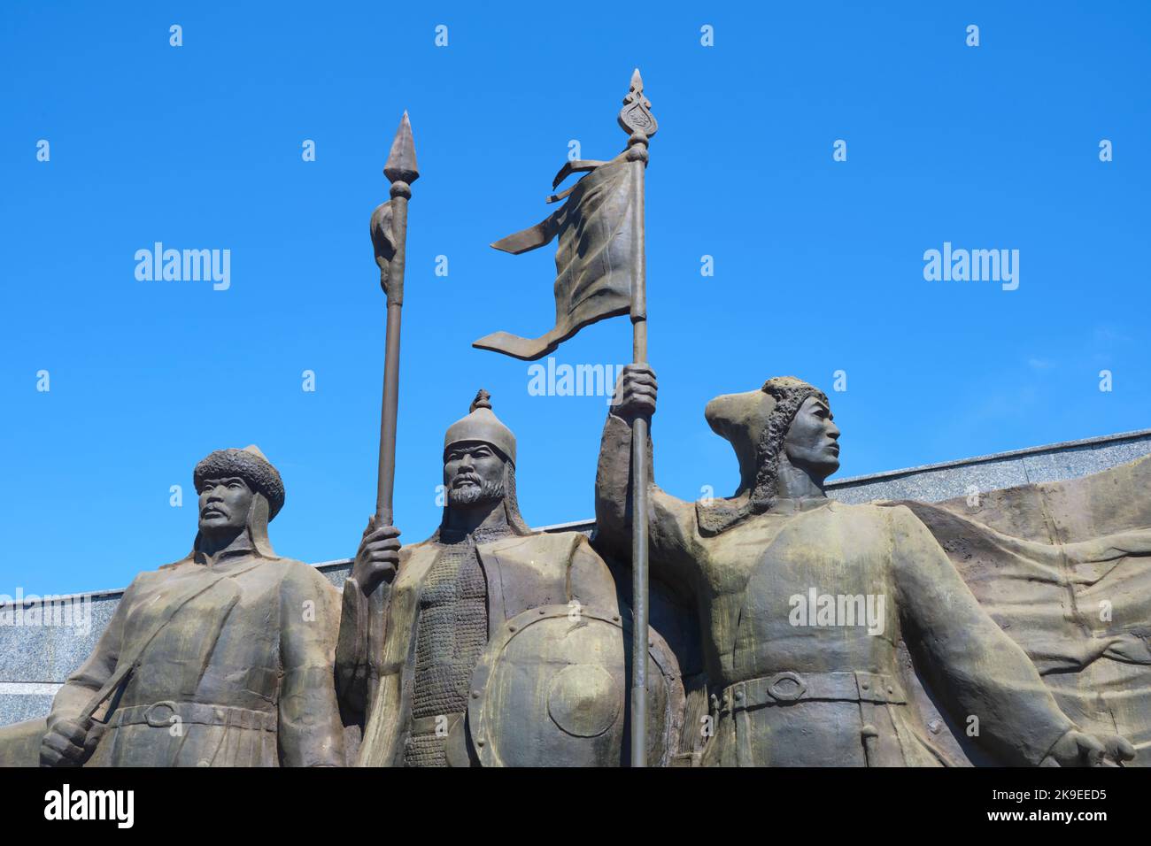 A view of the bronze frieze, depicting ancient Kazakh warriors in ...