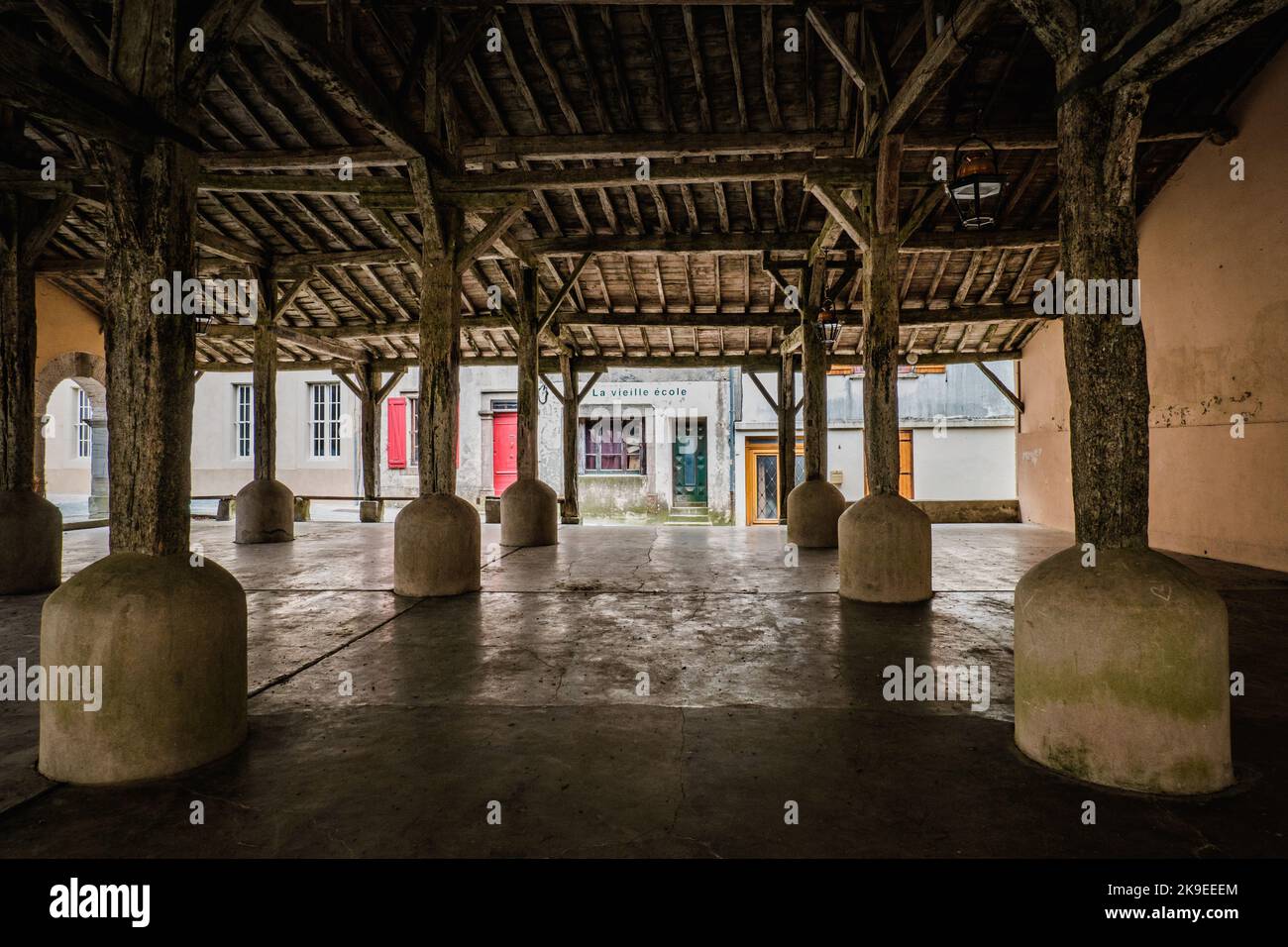 View on the wooden medieval covered market hall in the village of Fanjeaux in the South of France (Aude) Stock Photo