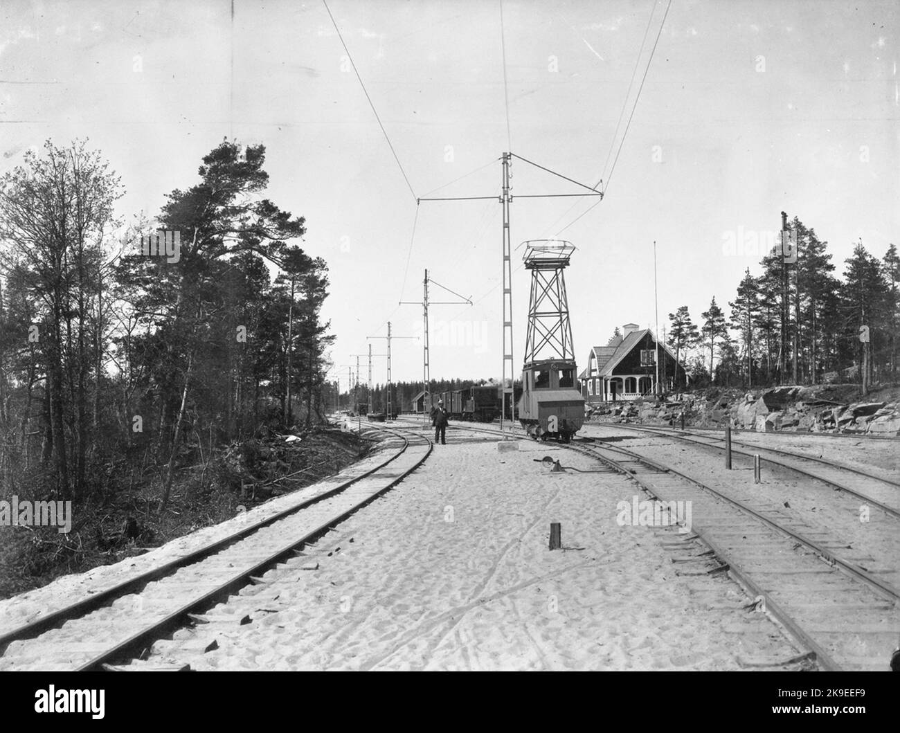 Skoghall Sawmill Elllok 7. Nordmark-Klarälven's railway, Nklij passenger trains in the background. Stock Photo