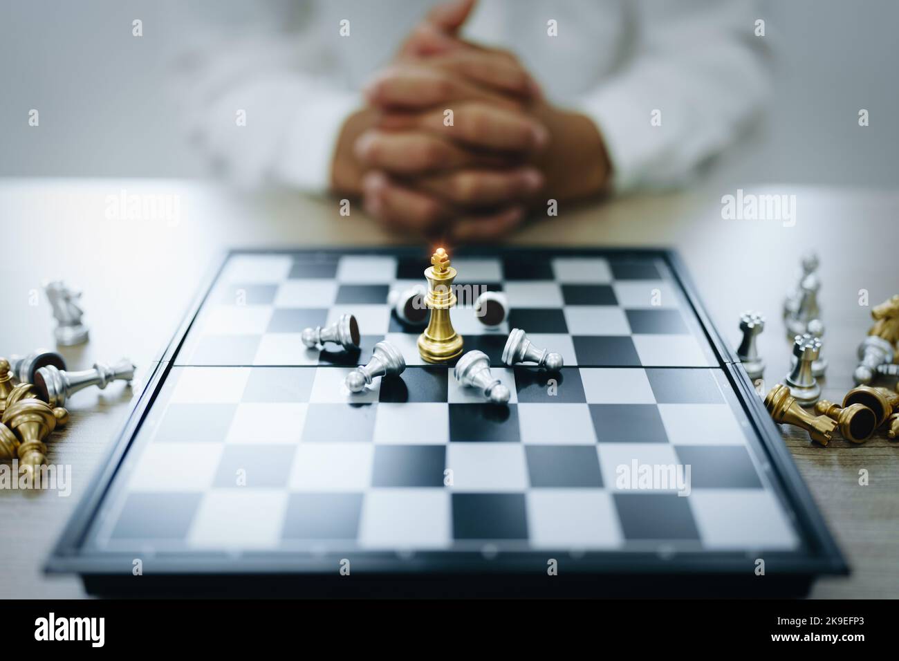 Playing and planning a chess walk, an entrepreneur is planning a business to compete with the competitors in the marketing Stock Photo