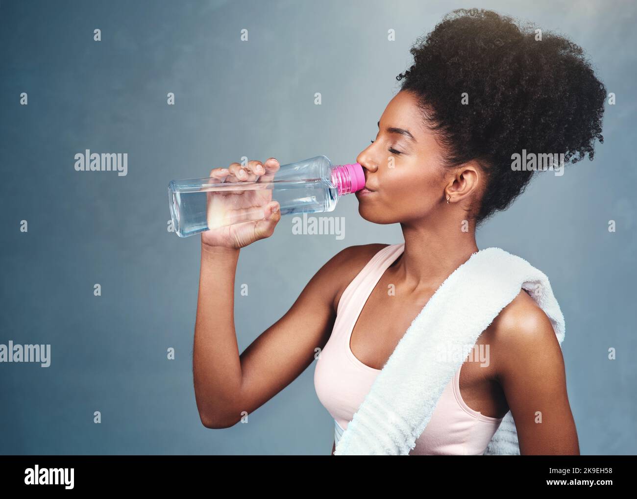 Drinking water helps maintain the balance of body fluids. a sporty