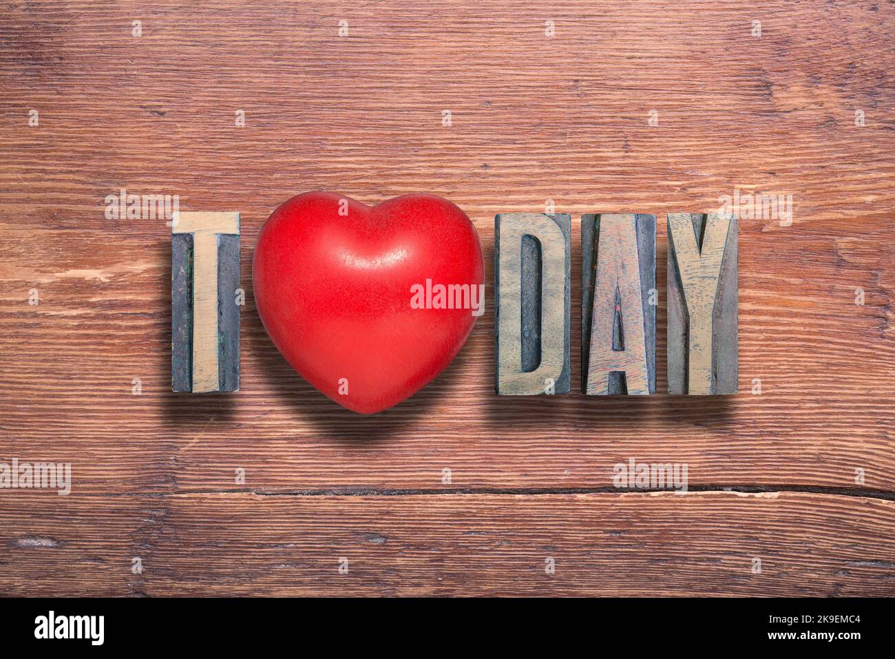 today word combined on vintage varnished wooden surface with heart symbol inside Stock Photo