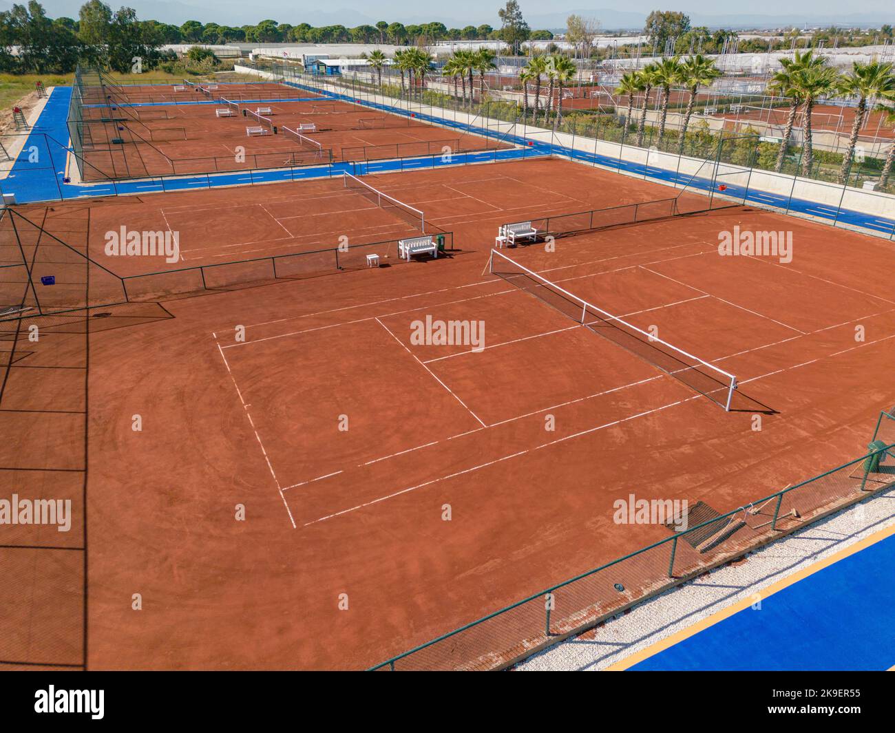 Aerial view of empty clay tennis court on a sunny day Stock Photo