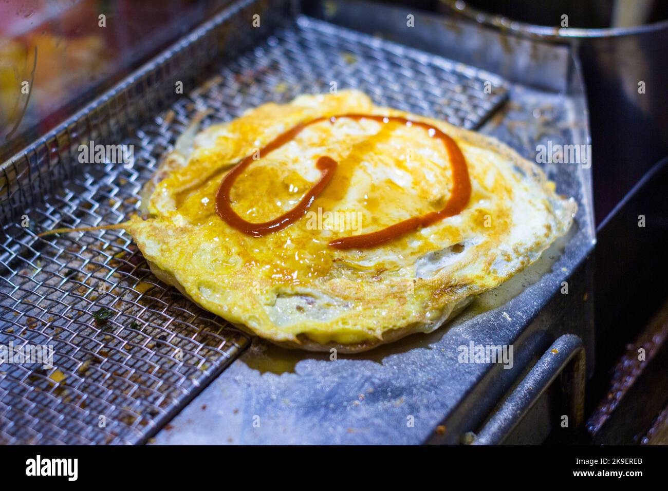 A local pancake at a night market in Taipei, Taiwan Stock Photo