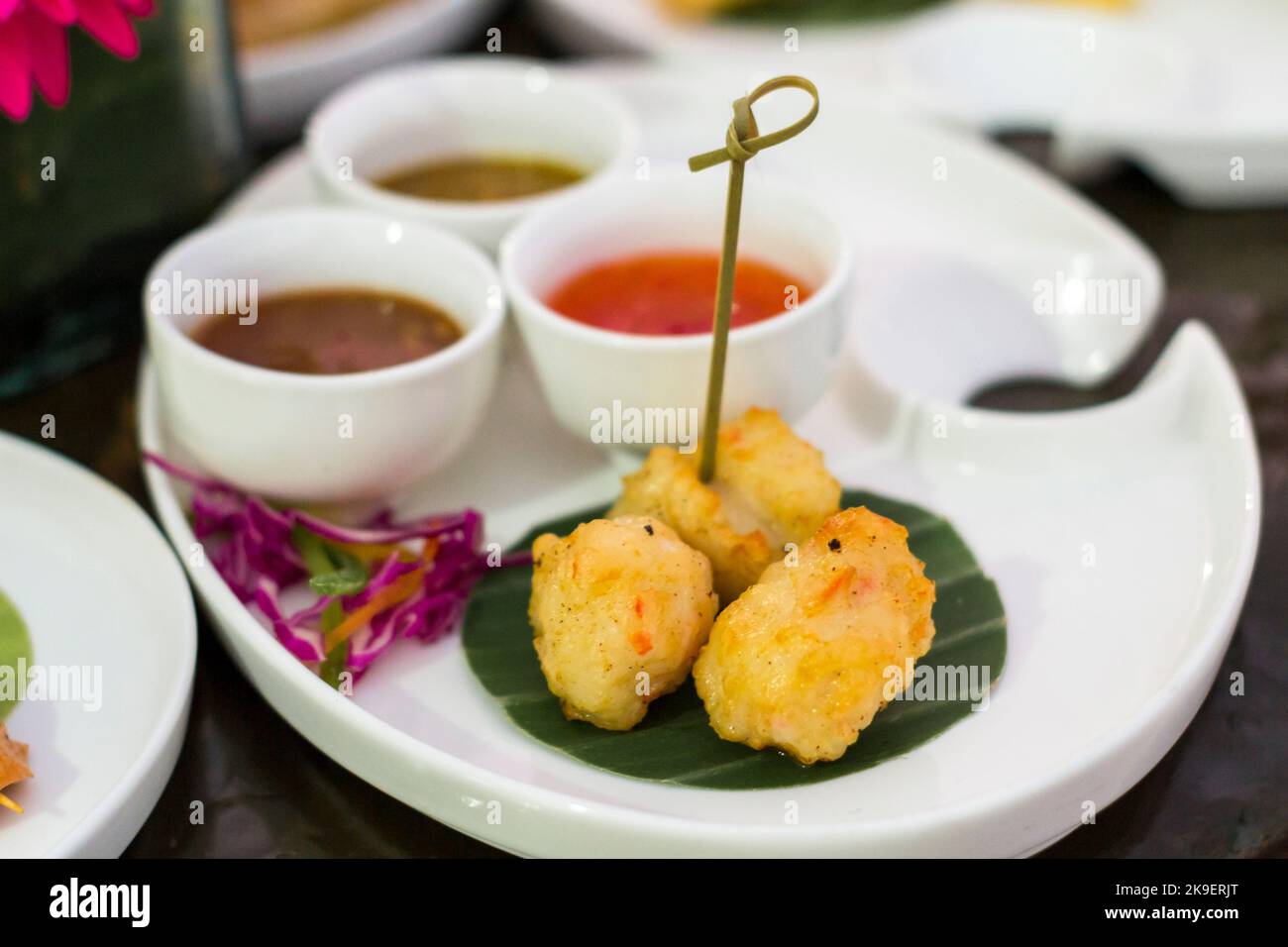 Filipino fish balls with condiments in Manila, Philippines Stock Photo