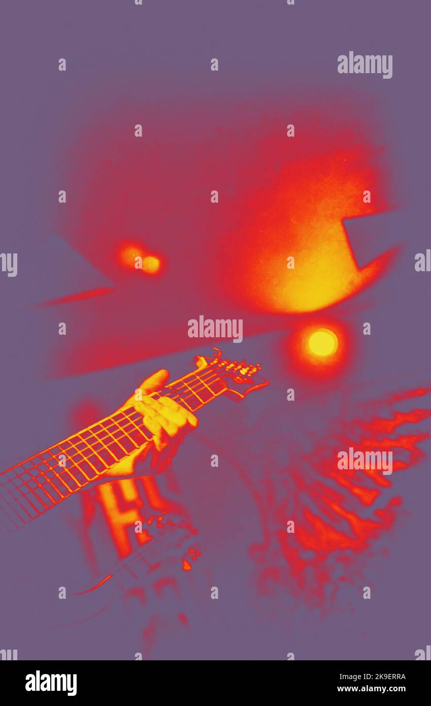 Electric guitar neck on stage, selective focus. Thermography gradients