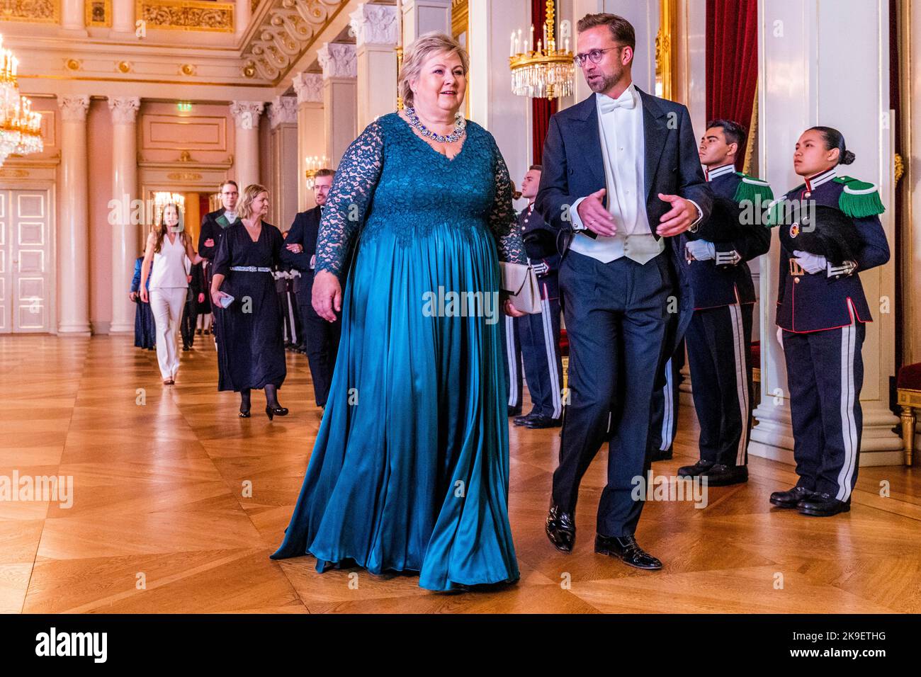 Oslo 20221027.Erna Solberg (Conservative party) and Nikolai Astrup (Conservative party) on their way to the gala dinner at the Palace on Thursday evening. It is an annual tradition that ministers, parliamentary representatives and representatives from the Norwegian public sector are invited to dinner by the royal couple. POOL. Photo: Haakon Mosvold Larsen / NTB Stock Photo