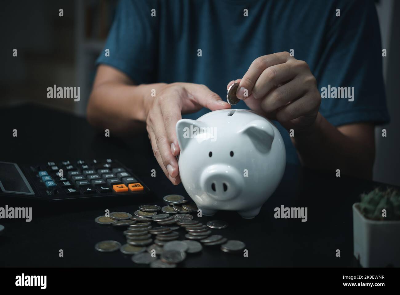 Saving money and coin Piggy bank.Business finance investment banking economy concept. Stock Photo