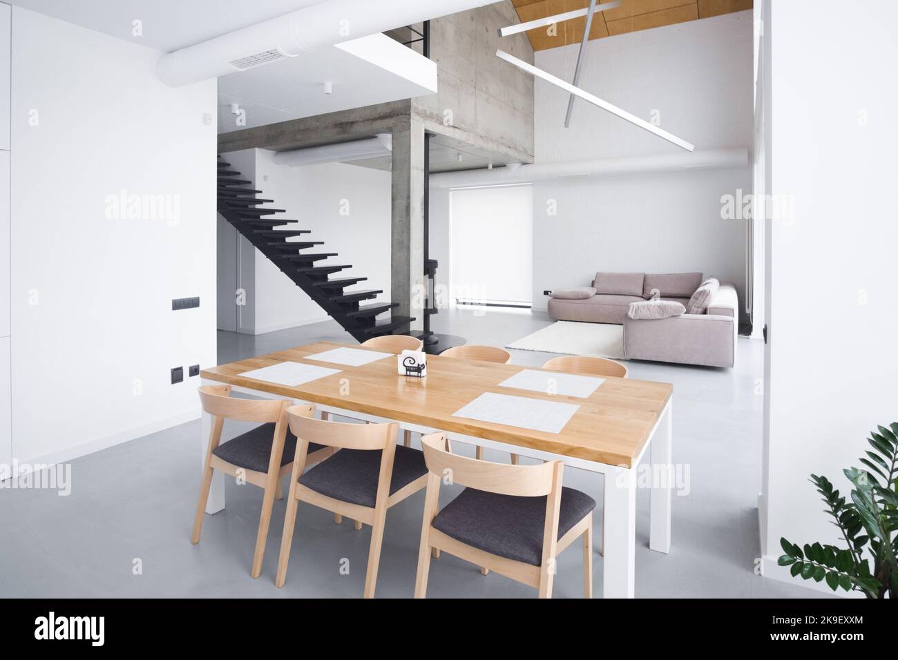 Ligh stylish wooden table in the kitchen. minimalism.Elegant white ...