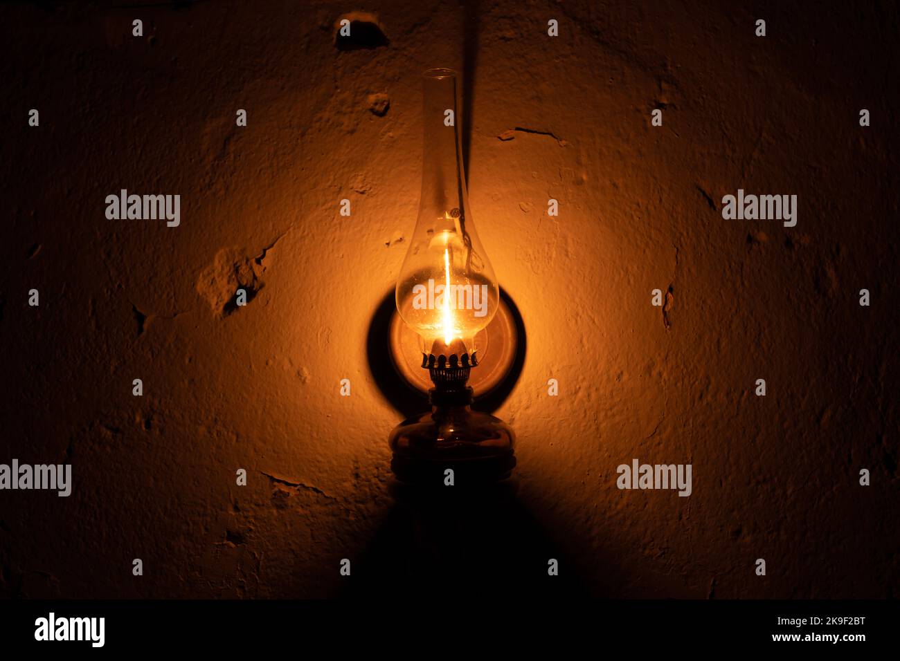 Kerosene lamp hanging on an old wall Stock Photo Alamy