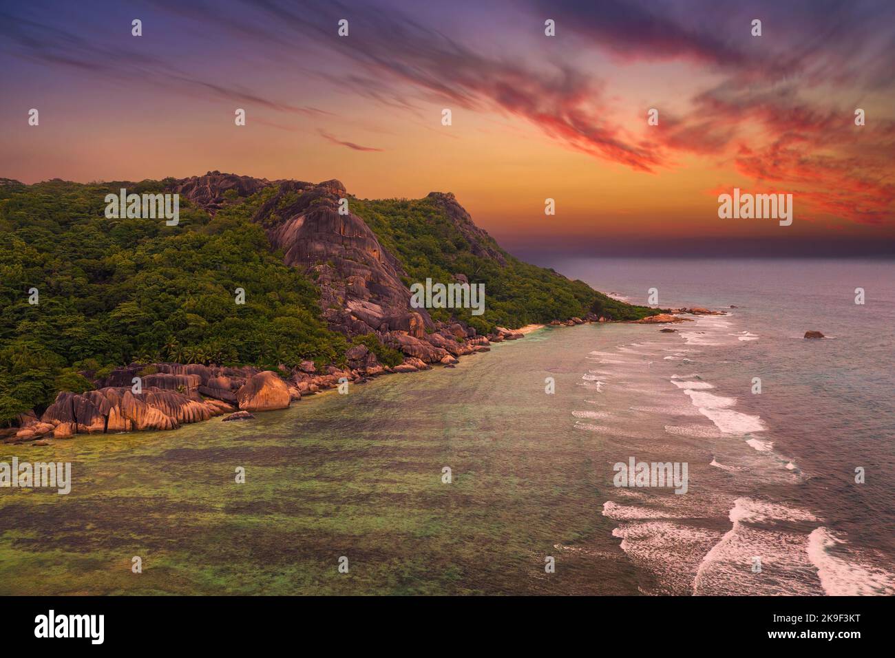 Sunset above Anse Source D'argent beach at the La Digue Island, Seychelles Stock Photo