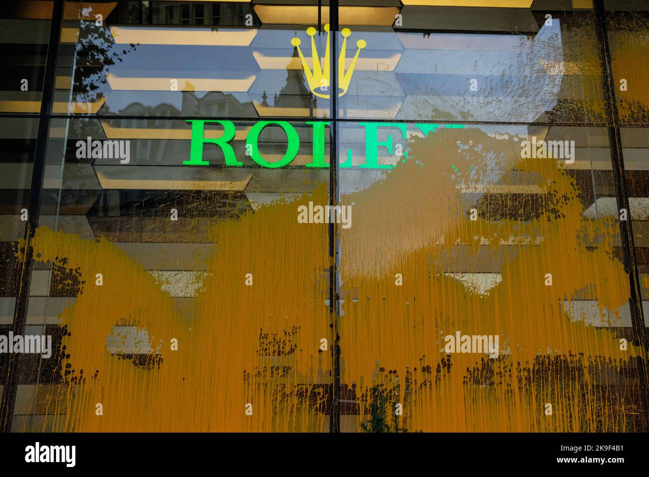 London, UK. 28 OCT 2022. Just Stop Oil spray paints Rolex store in Knightsbridge claiming time is running out. Credit: Joao Daniel Pereira/Alamy Live News Stock Photo