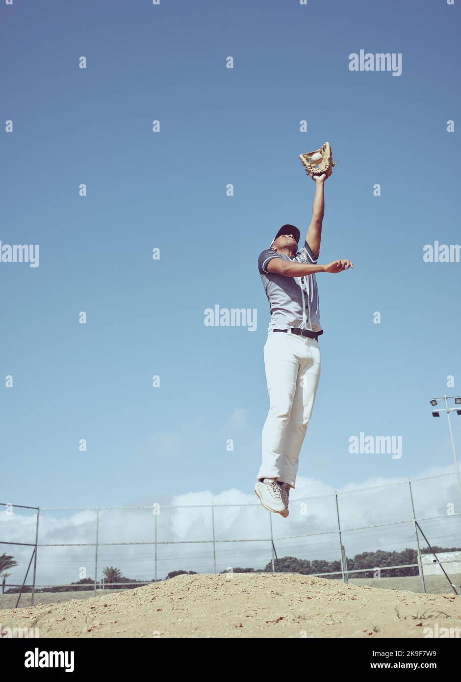 Baseball, athlete jump and sports game, man and fitness on baseball