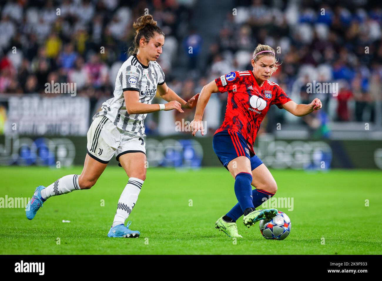 Turin, Italy. 27th Oct, 2022. Martina Lenzini (L) of Juventus Women FC and Eugene Le Sommer (R) of Olympique Lyonnais in action during the UEFA Women's Champions League 2022/23 - Group C football match between Juventus FC and Olympique Lyonnais at the Allianz Stadium. Final score; Juventus 1:1 Lyon. Credit: SOPA Images Limited/Alamy Live News Stock Photo