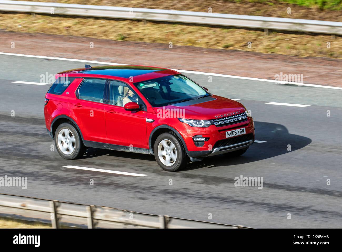 2016 Red LAND ROVER DISCOVERY SPORT TD4 SE TECH  1999CC Diesel SUV; travelling on the M6 motorway UK Stock Photo