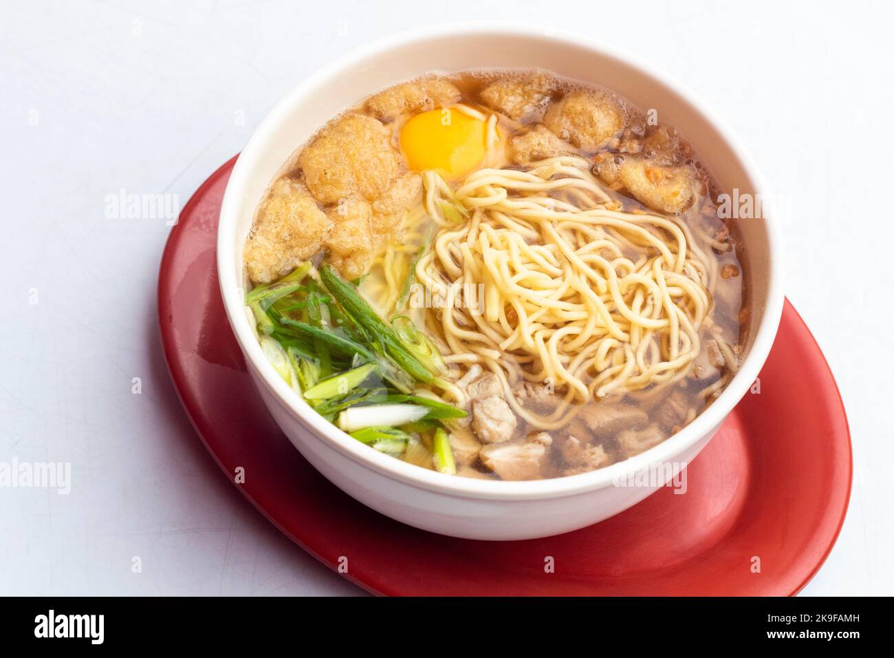 hearty bowl of batchoy, a noodle dish in the Philippines Stock Photo ...