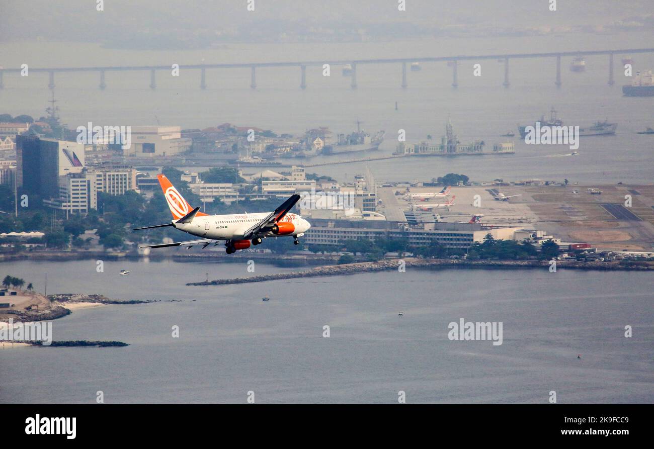 RIO DE JANEIRO, BRAZIL - JAN 30, 2015: GOL Aircraft landing in Santos Dumont Airpot in Rio de Janeiro, Brazil. GOL became a world reference for democr Stock Photo