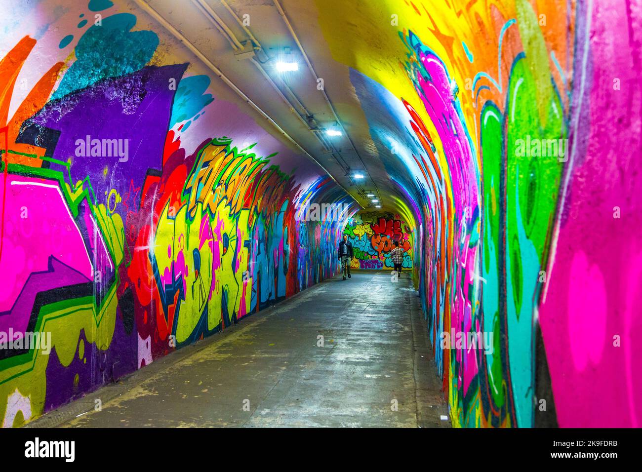 New York, USA - OCT 22, 2015: mural paintings at wall of metro station in 191st Street, New York, USA. Some of the old tunnels are legally open for ar Stock Photo