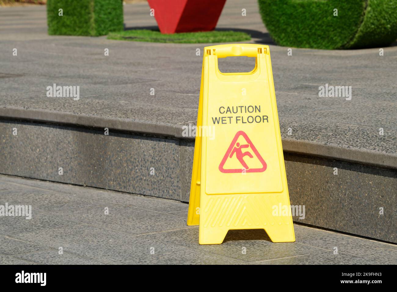 Sign, caution wet floor, falling hazard, slipping risk, visual communication, warning graphic