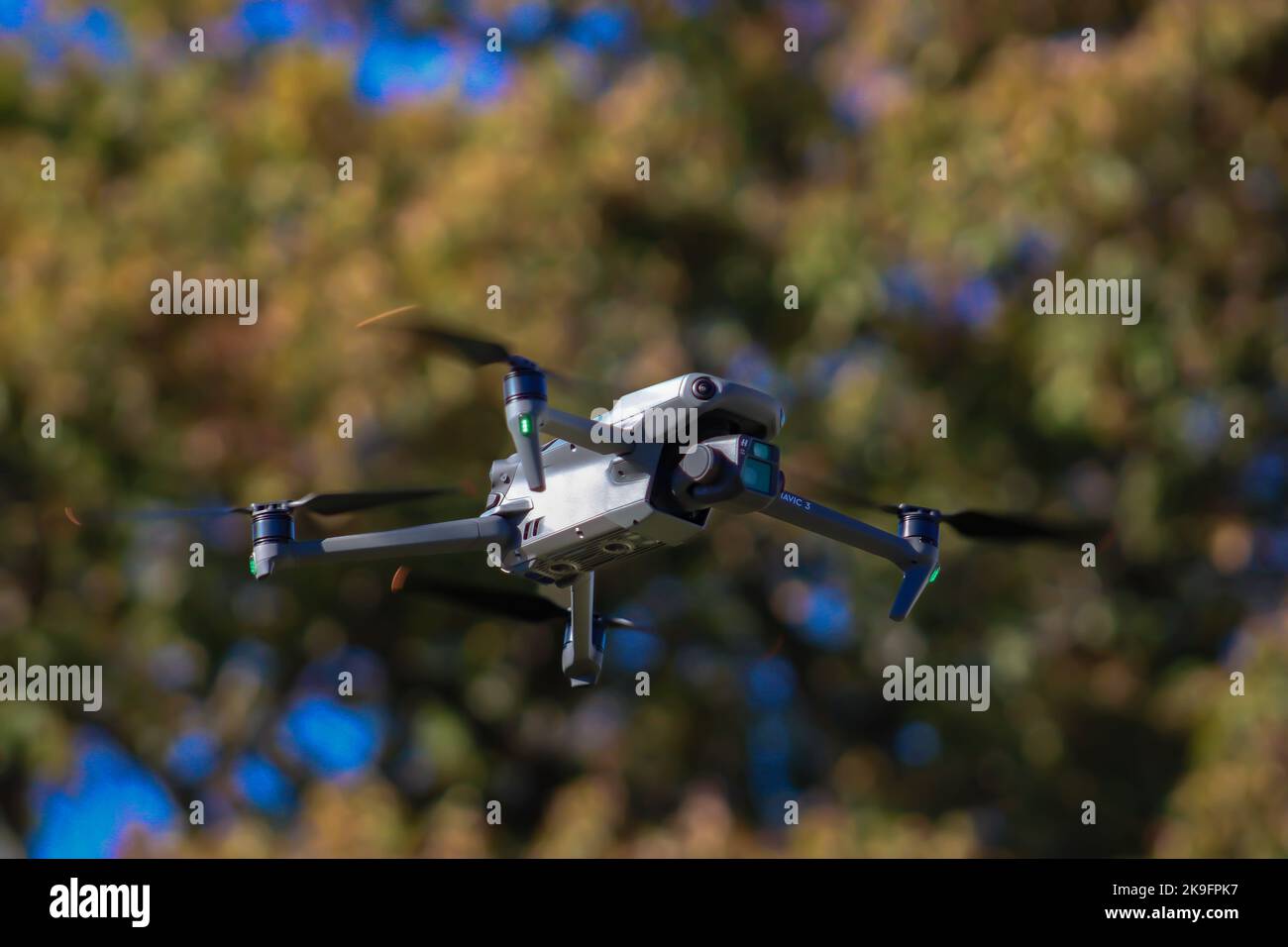 Drone flying in midair Stock Photo