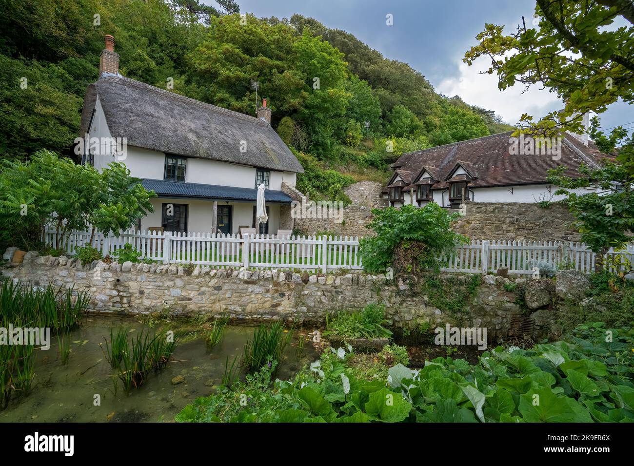 Thatched cottages at Lulworth Cove, West Lulworth, Jurassic Coast, Dorset, England,Uk Stock Photo