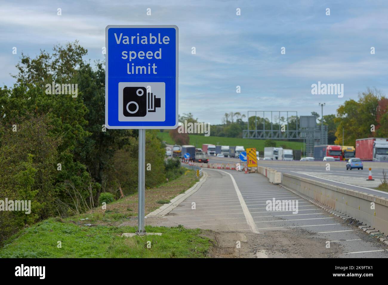 Sign informing of variable speed limit on the M1 motorway, England