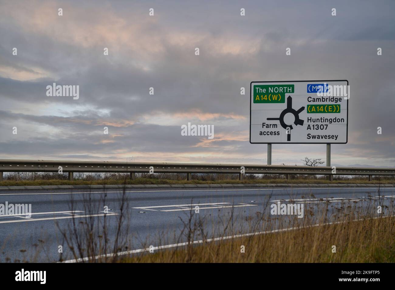 Roundabout Sign On The A14 Road Cambridgeshire England Stock Photo roundabout-sign-on-the-a14-road-cambridgeshire-england-stock-photo