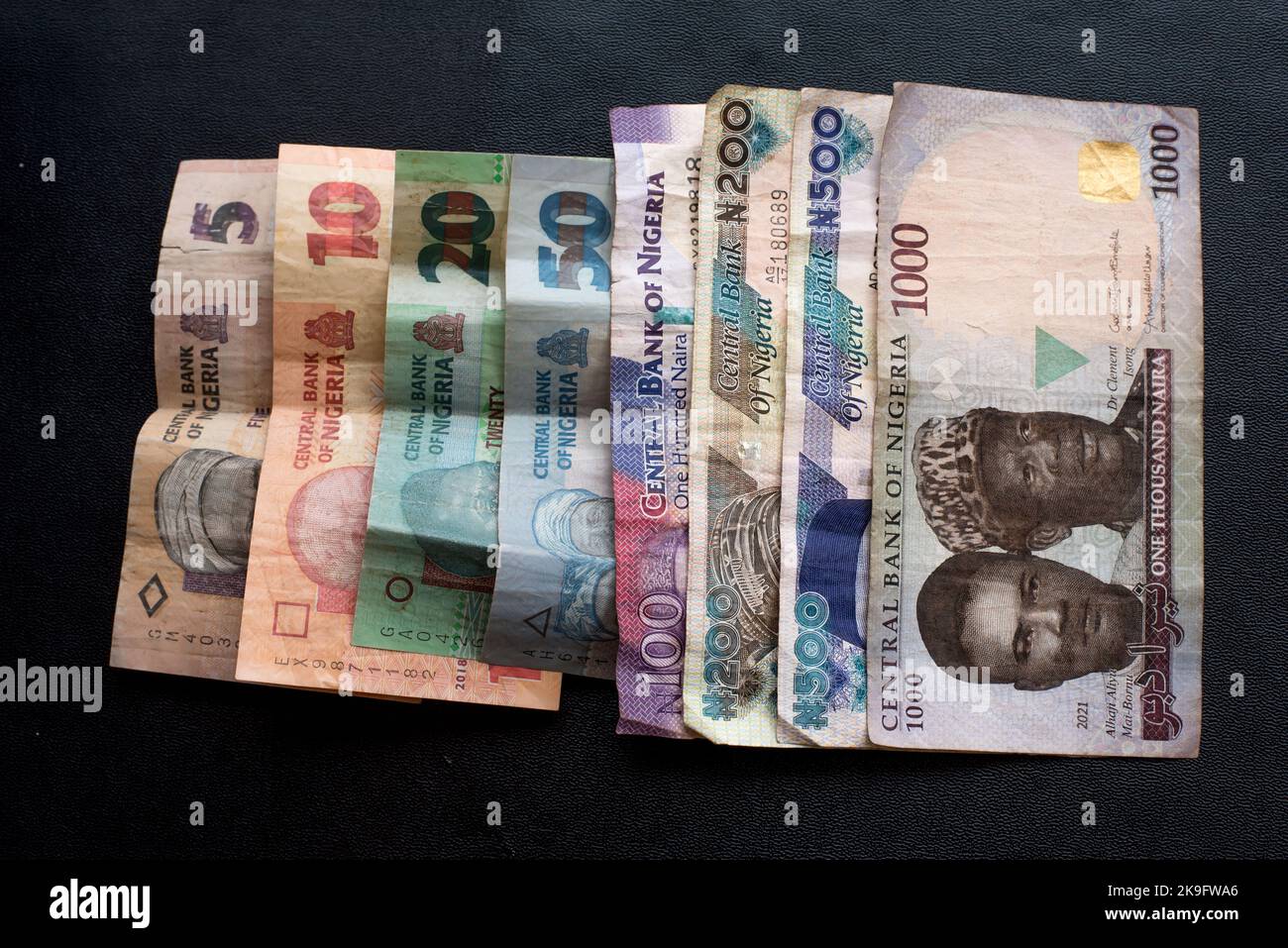 Big amount of Nigerian notes, old bill. Nigerian banknotes close-up. Rich life conceptual Stock Photo