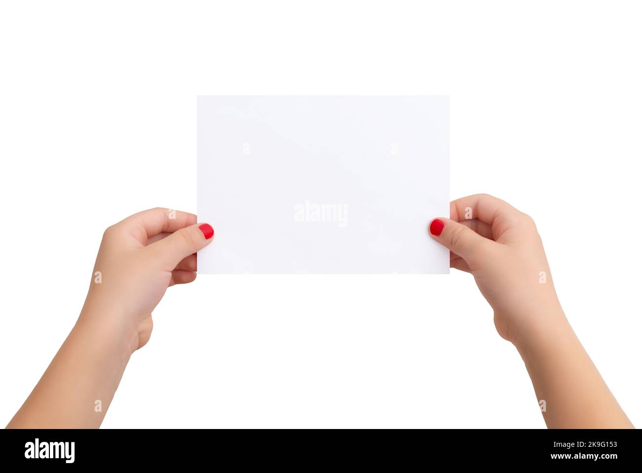 Isolated female hands and blank paper for copy presentation Stock Photo