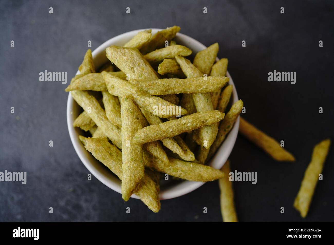Green snap pea chips healthy snacks, selective focus Stock Photo Alamy