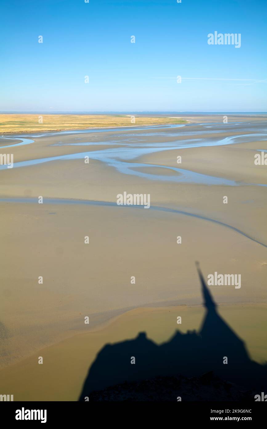 Aerial view from Mont Saint Michel Normandy France with low tide. The silhouette of the abbey Stock Photo