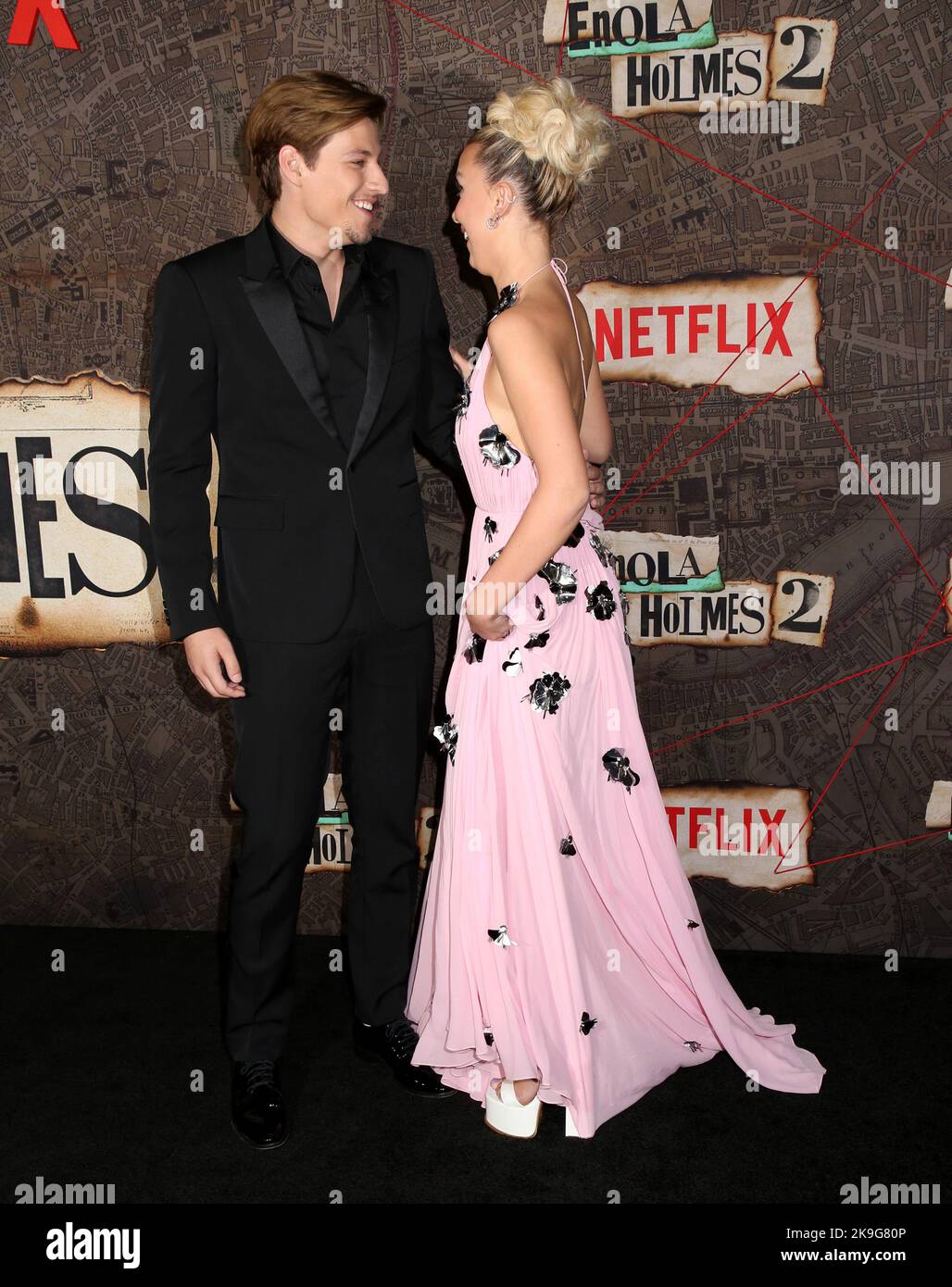 Jake Bongiovi and Millie Bobby Brown wearing dress by Louis Vuitton attends  premiere of Enola Holmes 2 by Netflix at Paris Theater in New York on  October 27, 2022 Stock Photo - Alamy