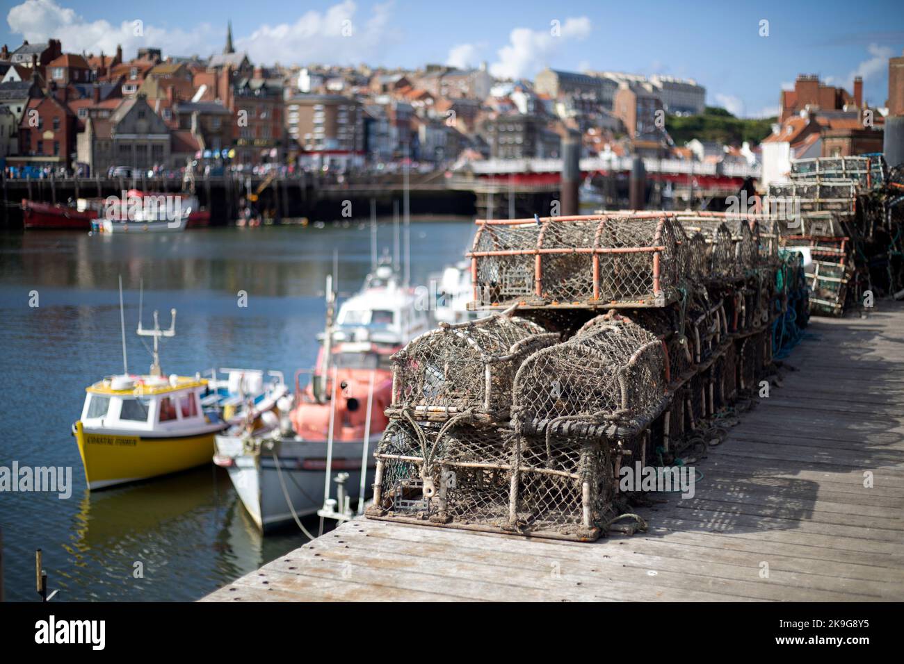 Lobster Pots in seaside port town of Whitby in North Yorkshire. local fisherman and the community have suffered in the past year with large numbers de Stock Photo